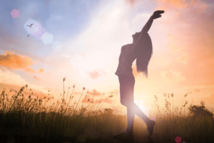 An image of a person in bright sunlight doing exercise. The image is used to highlight- Why Mental Health is Important