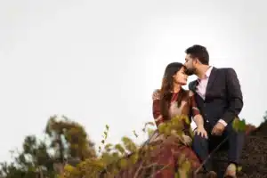 Photo of a Man Kissing a Woman on Forehead to keep romance alive. 