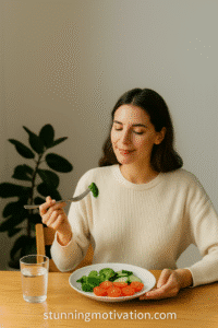 A serene dining scene with a young woman sitting at a rustic wooden table, enjoying a healthy meal in a softly lit, minimalist room. Mindful eating tips.