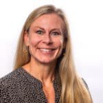 Image of Amanda Hull, A certified personal trainer, nutritionist, health coach. Amanda is also a seasoned marketing professional and the author of Rooted: The Down-to-Earth Basics of Wellness.